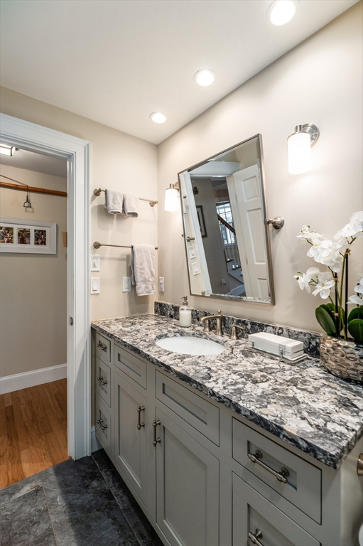 25 Salt Island Road Gloucester, MA 01930 - Photo 16 of 37 a bathroom with a granite countertop sink and a mirror