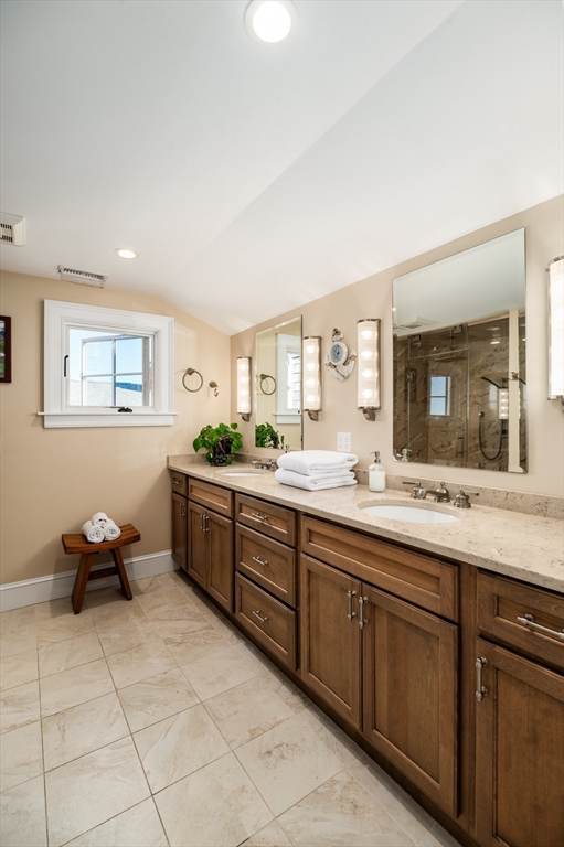 25 Salt Island Road Gloucester, MA 01930 - Photo 21 of 36 a spacious bathroom with a granite countertop sink a mirror and a