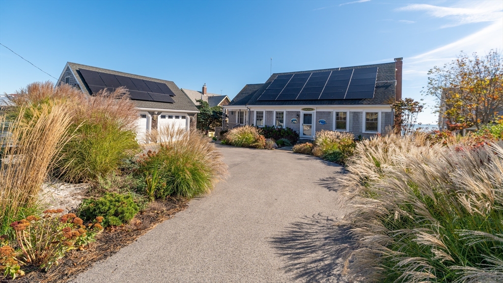 25 Salt Island Road Gloucester, MA 01930 - Photo 37 of 37 front view of a house with a yard