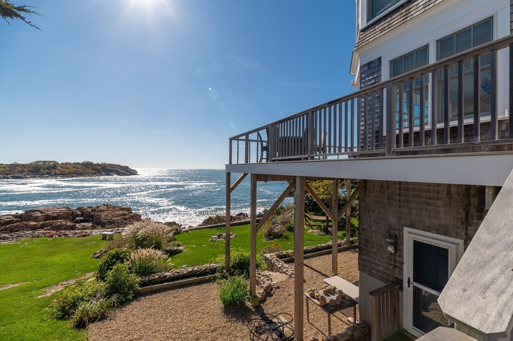 25 Salt Island Road Gloucester, MA 01930 - Photo 5 of 36 a view of a balcony with an ocean view
