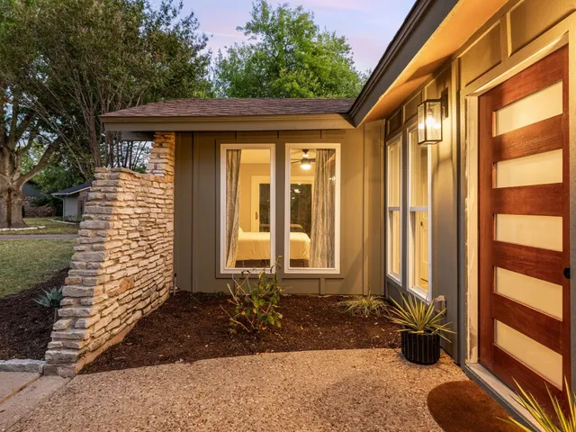 a kitchen with appliances cabinets and a counter top space