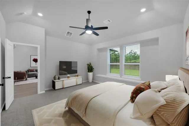 a bathroom with a double vanity sink toilet mirror and bathtub