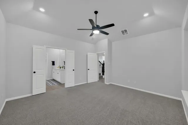 an empty room with windows