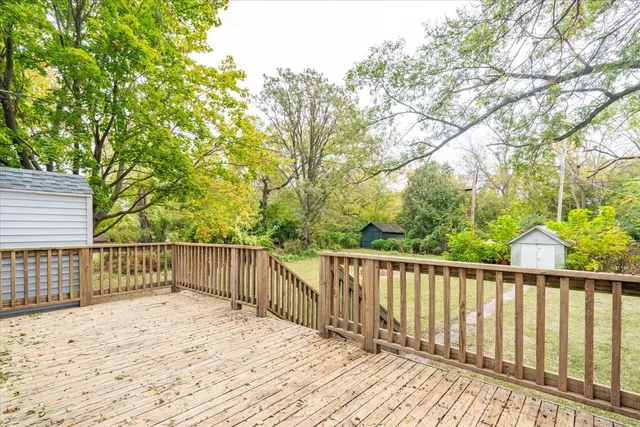 a view of a wooden fence