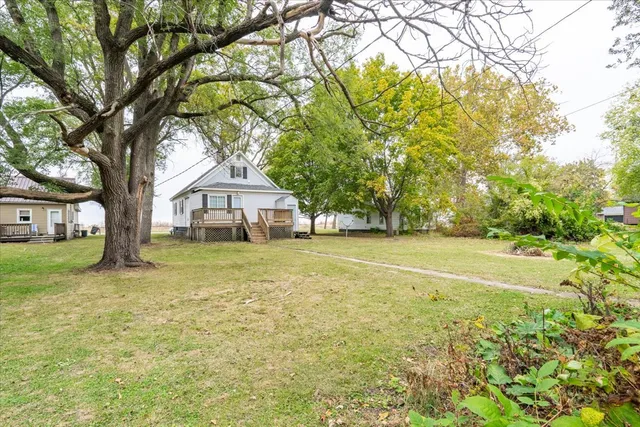 a house with trees in front of it