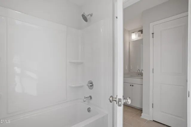 a big house with a swimming pool in front of it