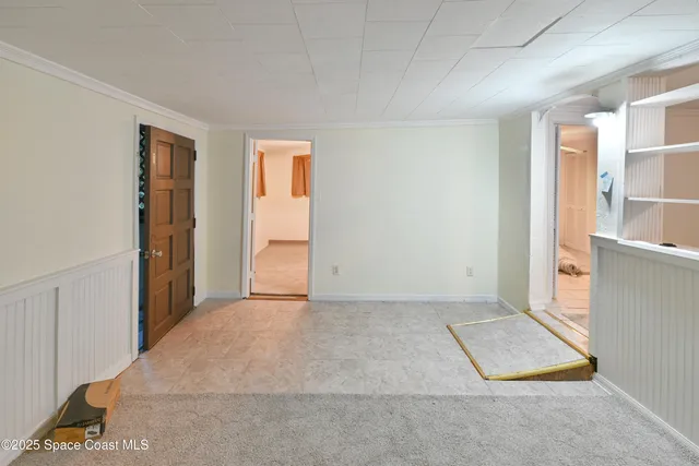 a view of kitchen with furniture and window