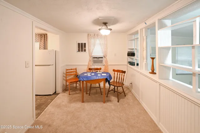 a kitchen with granite countertop a sink stove and cabinets