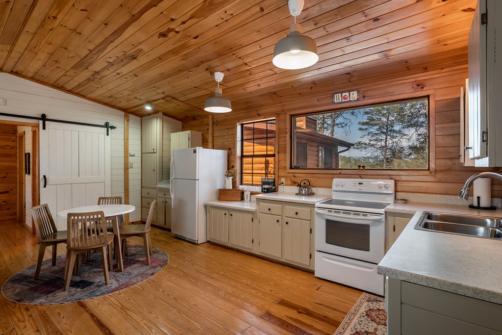 233 River Hills Road Mineral Bluff, GA 30559 - Photo 26 of 64 Private screened in porch off the Primary bedroom
