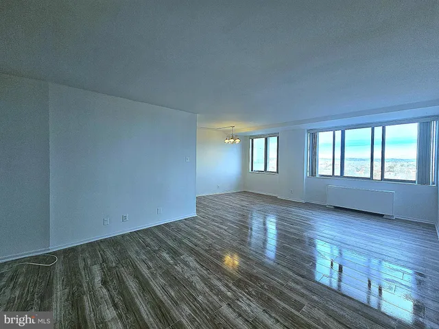 a view of an empty room and window