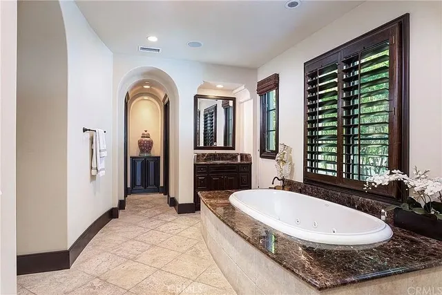 a view of a swimming pool with an ocean view