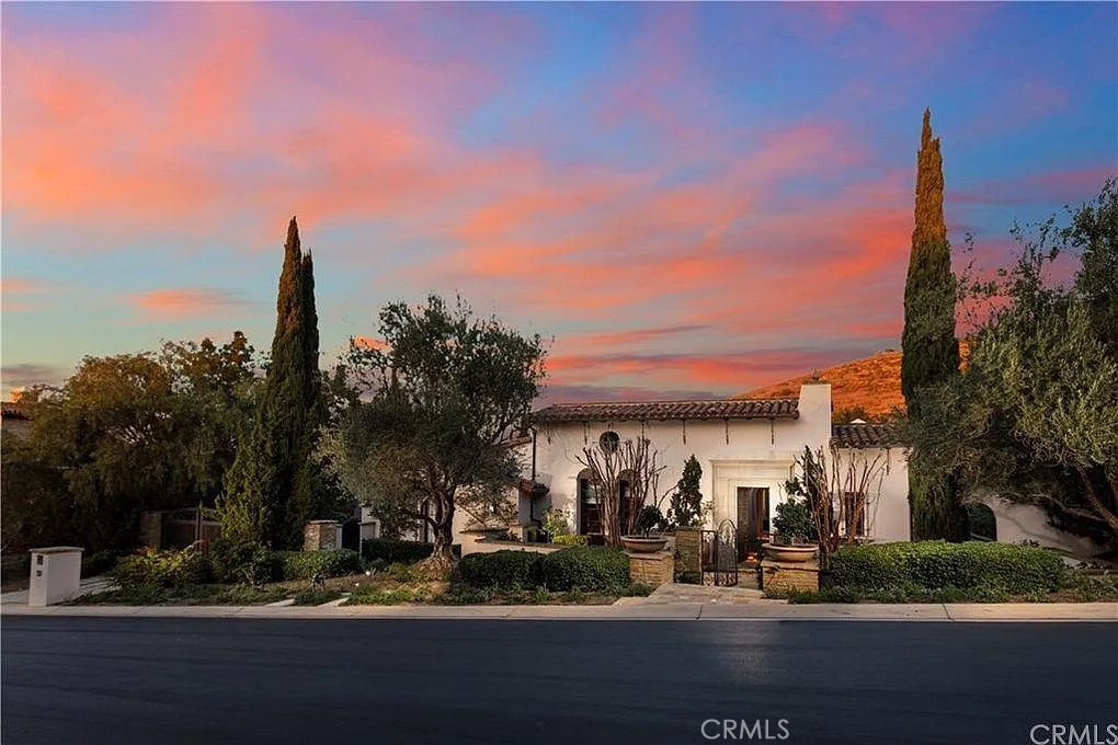 59 Vernal Spring Irvine, CA 92603 - Photo 2 of 33 a front view of a building with street view