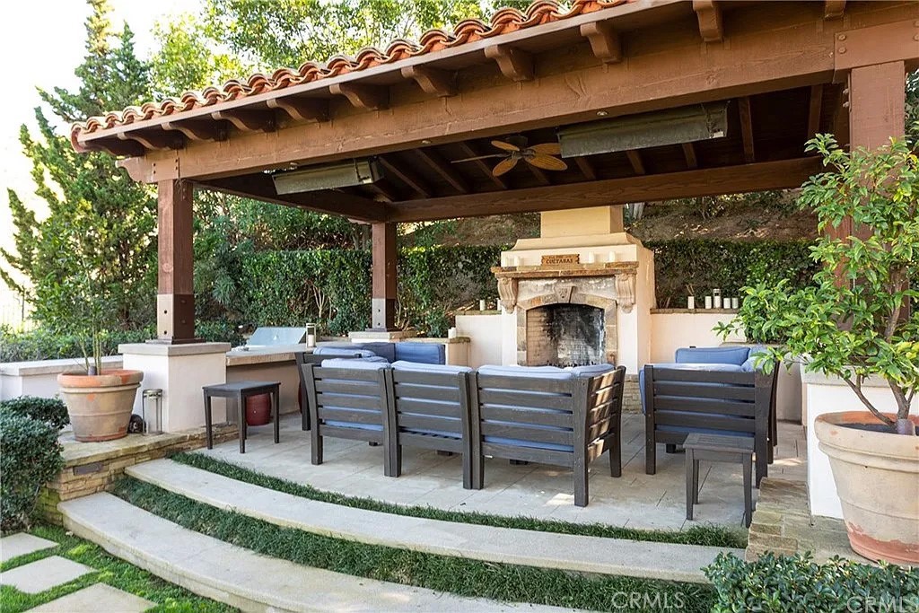 59 Vernal Spring Irvine, CA 92603 - Photo 23 of 33 a view of house with a deck and furniture