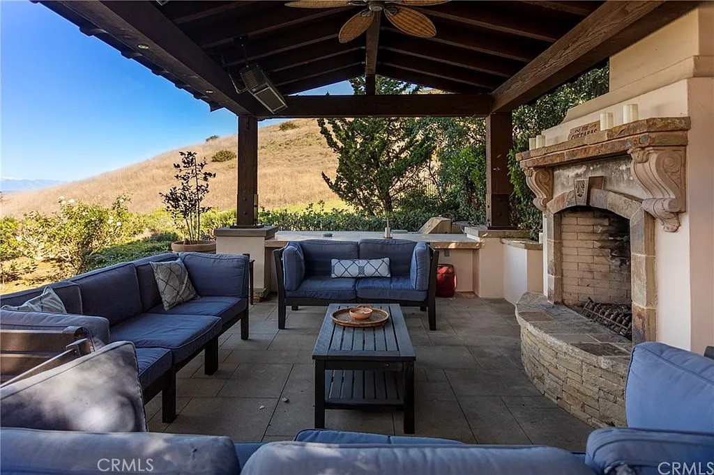 59 Vernal Spring Irvine, CA 92603 - Photo 24 of 33 a outdoor living space with furniture and mountain view