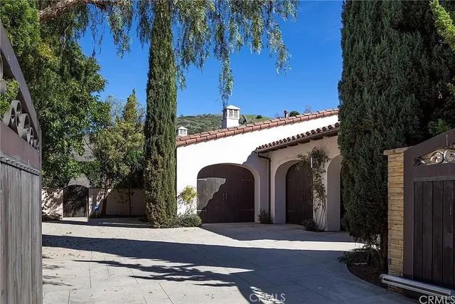 a backyard of a house with lots of green space