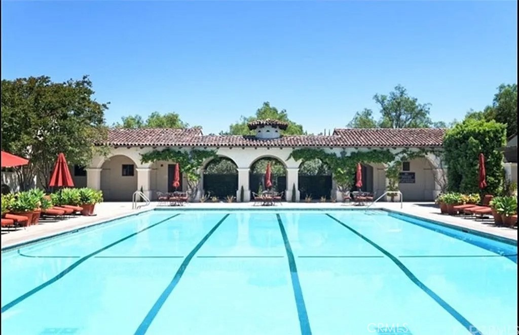 59 Vernal Spring Irvine, CA 92603 - Photo 33 of 33 a front view of house with yard patio and outdoor seating