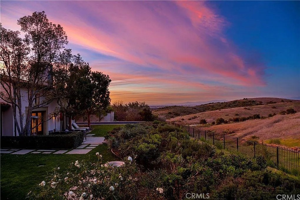 59 Vernal Spring Irvine, CA 92603 - Photo 4 of 33 a view of a field with an trees