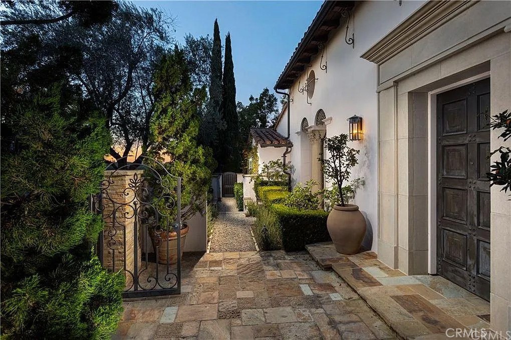 59 Vernal Spring Irvine, CA 92603 - Photo 6 of 33 a view of a patio with plants and furniture