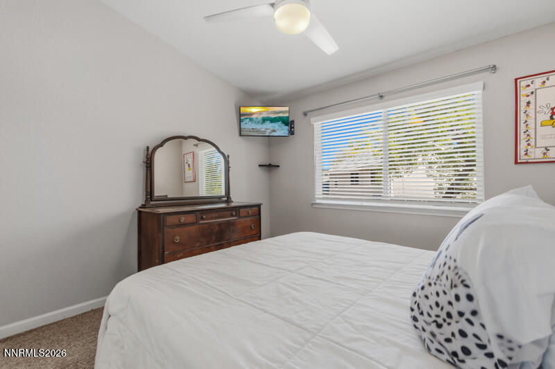 675 College Drive Reno, NV 89503 - Photo 22 of 30 a bedroom with a bed and a window