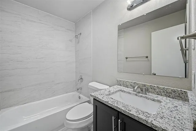 a view of a porch with wooden floor and roof