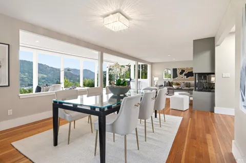 a bedroom with bed and large window