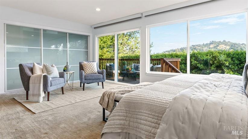 183 Reservoir Road San Rafael, CA 94901 - Photo 30 of 62 a bedroom with a bed and a large window