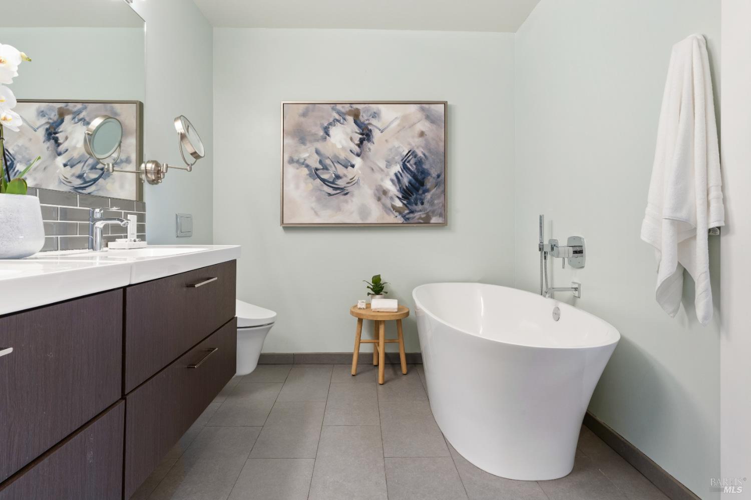 183 Reservoir Road San Rafael, CA 94901 - Photo 35 of 62 a white bath tub sitting next to a white sink and vanity