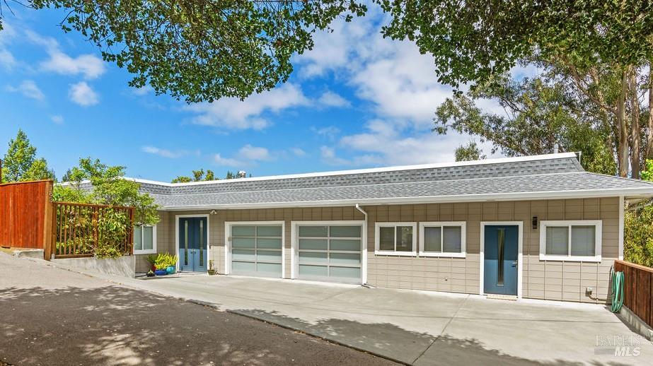 183 Reservoir Road San Rafael, CA 94901 - Photo 5 of 63 The approach feels modern and welcoming with plenty of parking in front of the home.