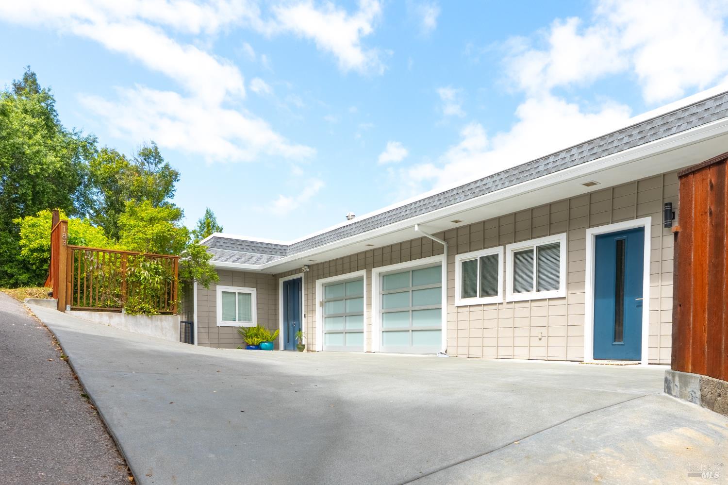 183 Reservoir Road San Rafael, CA 94901 - Photo 9 of 63 The approach is easy with plenty of parking in front and a 2.5 car garage with modern glass doors --- just wait until you enter inside!!!