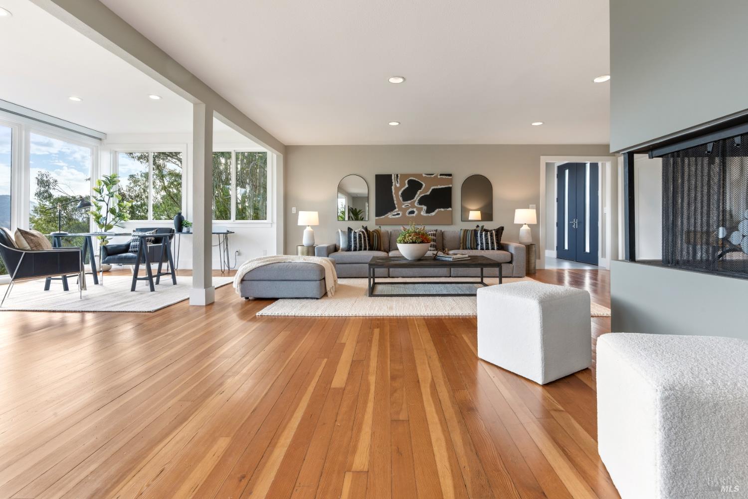 183 Reservoir Road San Rafael, CA 94901 - Photo 10 of 62 a living room with furniture and a wooden floor