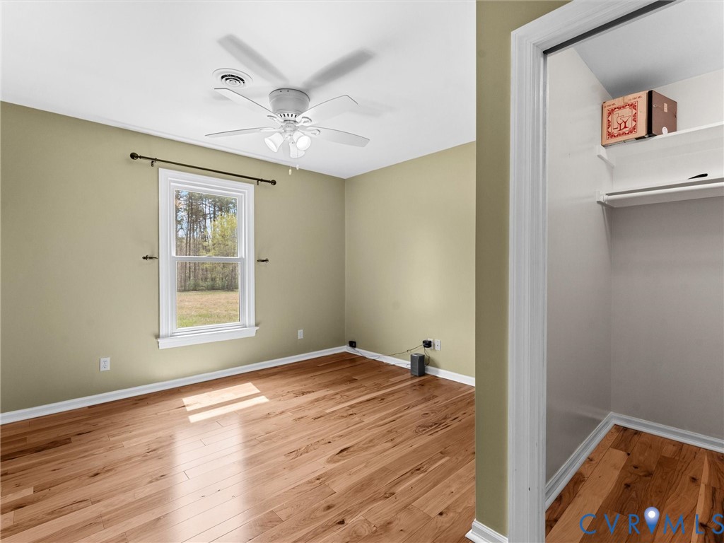 425 Starview Lane Gum Spring, VA 23065 - Photo 33 of 67 a view of an empty room with window and wooden floor