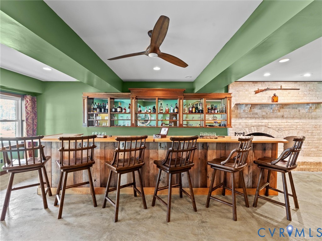 425 Starview Lane Gum Spring, VA 23065 - Photo 44 of 67 a view of a dining room with furniture and a chandelier