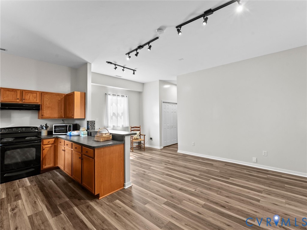 425 Starview Lane Gum Spring, VA 23065 - Photo 59 of 67 a kitchen with stainless steel appliances granite countertop a stove and a sink