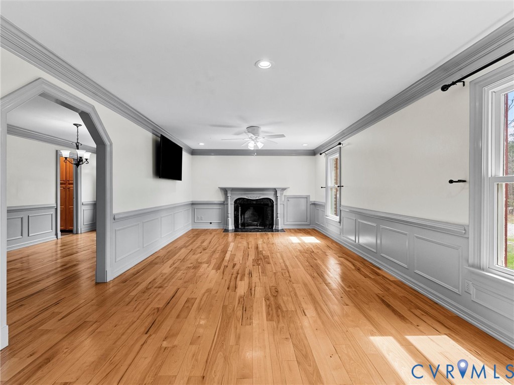 425 Starview Lane Gum Spring, VA 23065 - Photo 10 of 67 a view of empty room with wooden floor and fireplace