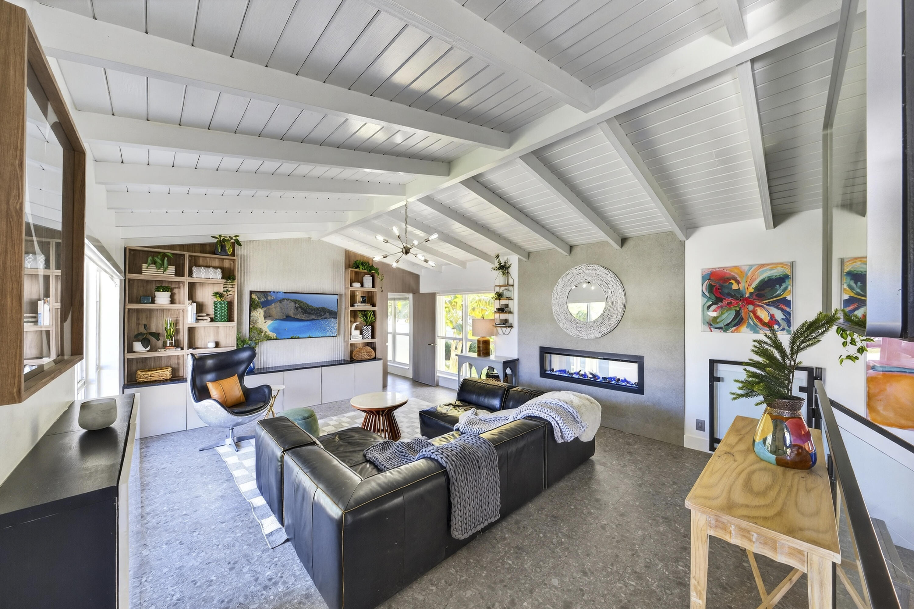 2630 Northeast 25th Street Lighthouse Point, FL 33064 - Photo 19 of 37 a living room with furniture and a flat screen tv