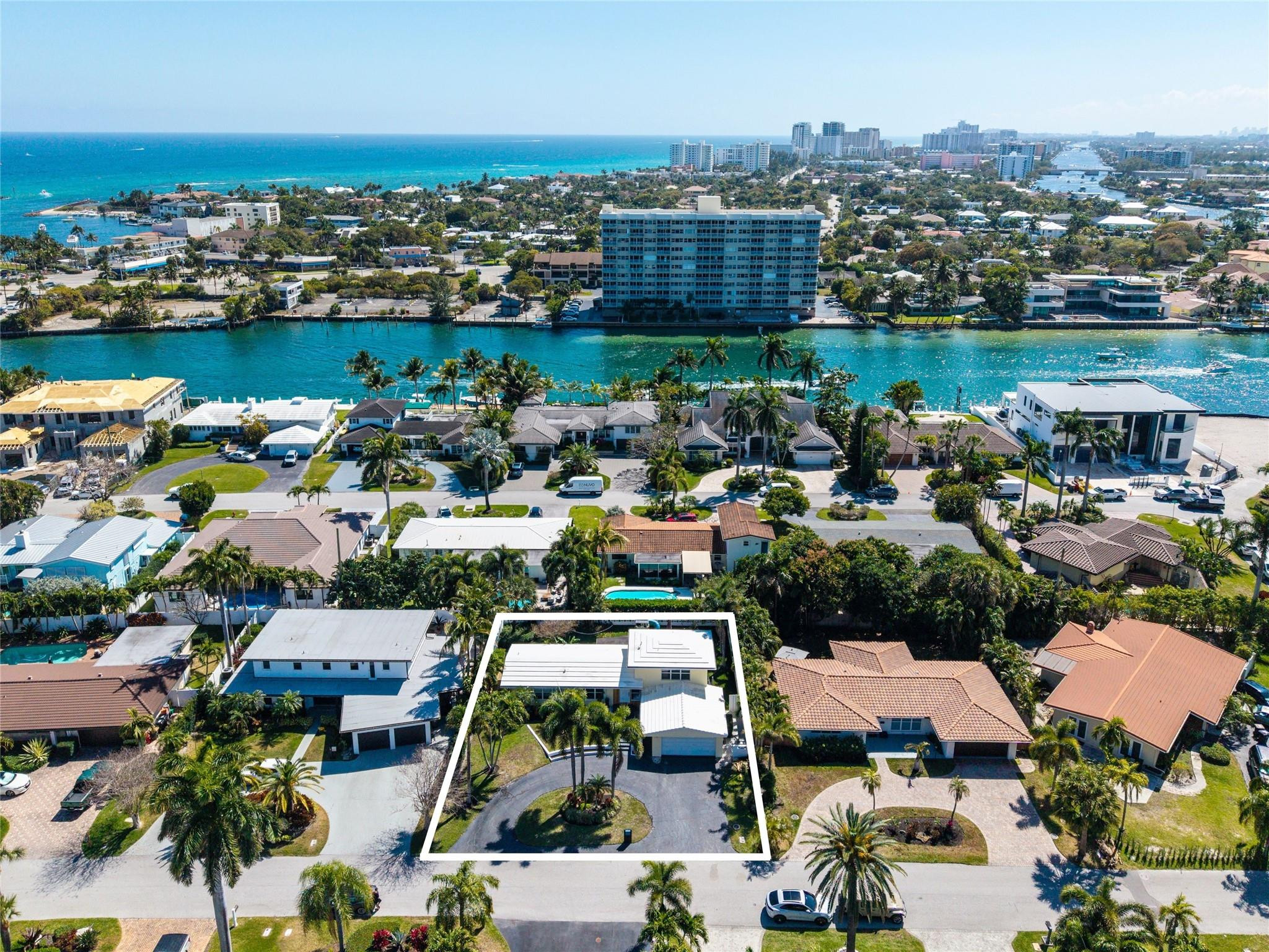 2630 Northeast 25th Street Lighthouse Point, FL 33064 - Photo 2 of 5 an aerial view of a city with houses
