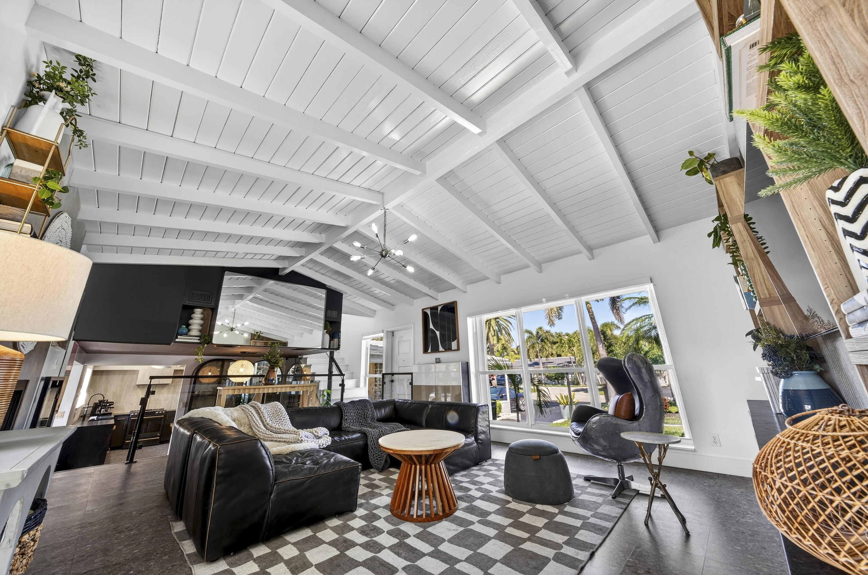 2630 Northeast 25th Street Lighthouse Point, FL 33064 - Photo 21 of 37 a living room with fireplace furniture and a large window