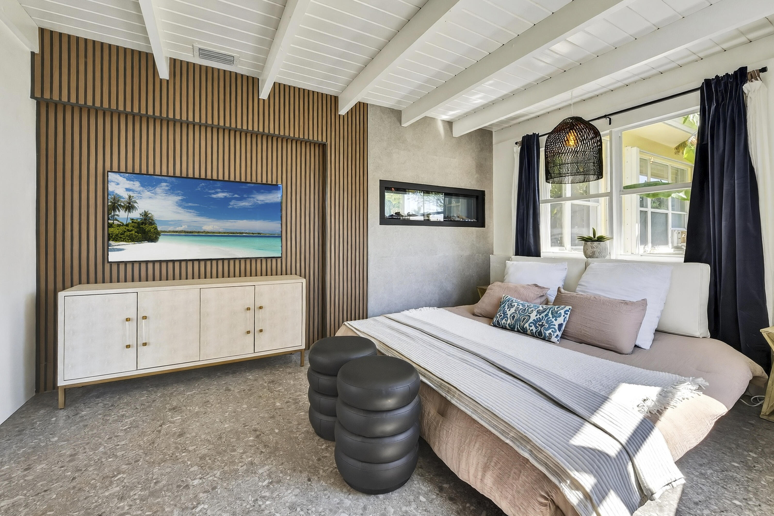2630 Northeast 25th Street Lighthouse Point, FL 33064 - Photo 27 of 37 a bedroom with a bed and a window
