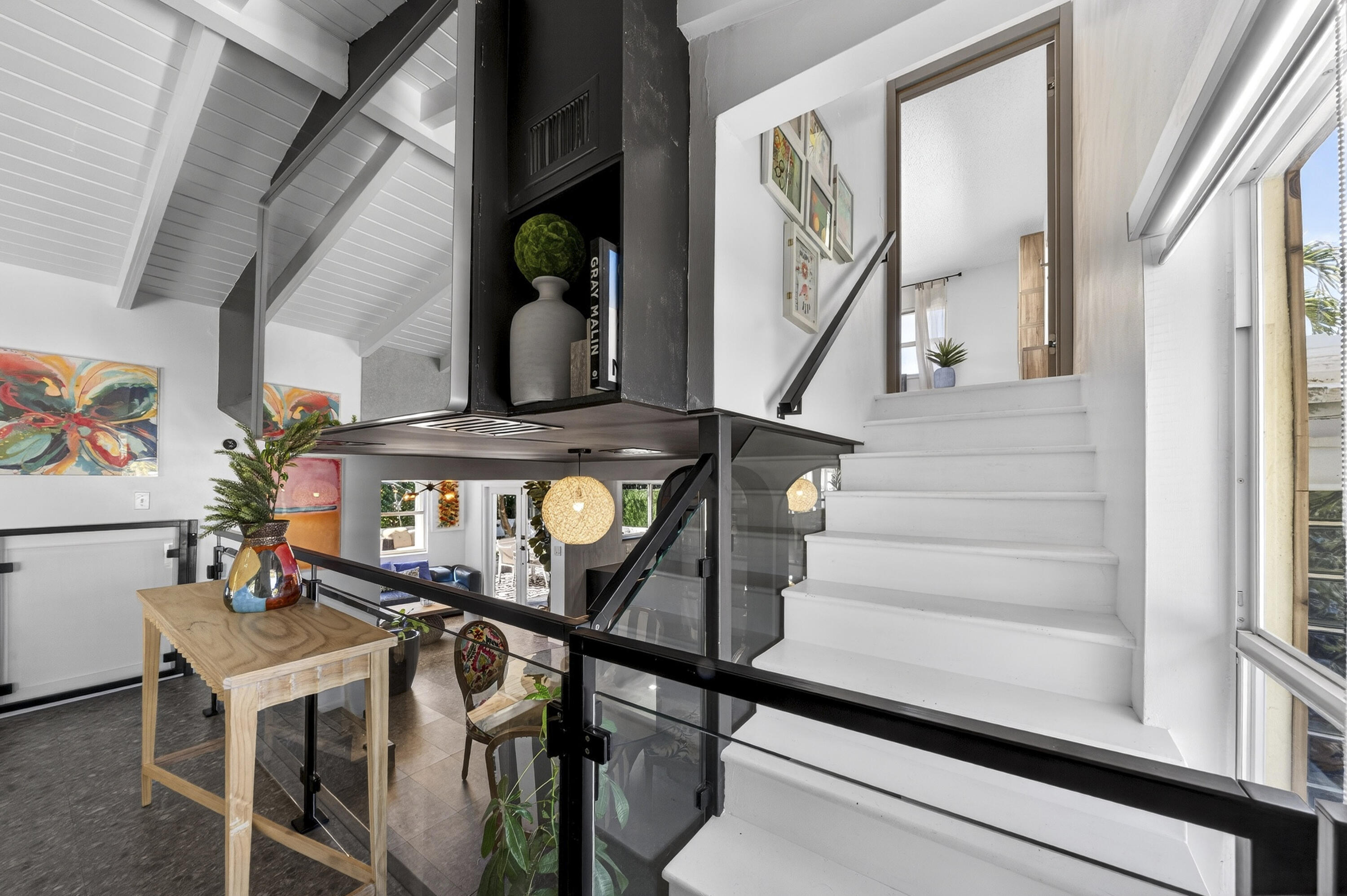 2630 Northeast 25th Street Lighthouse Point, FL 33064 - Photo 28 of 37 a view of entryway and hall with wooden floor