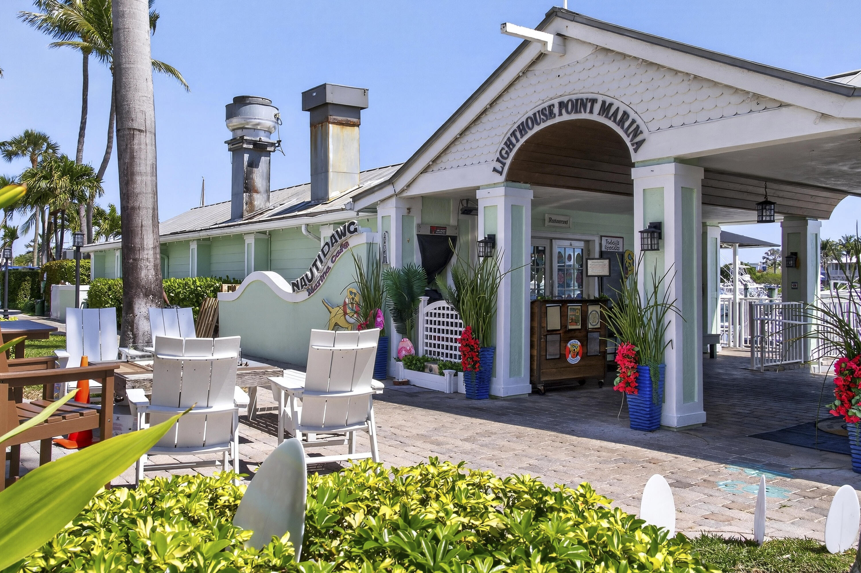 2630 Northeast 25th Street Lighthouse Point, FL 33064 - Photo 30 of 37 a front view of a house with garden