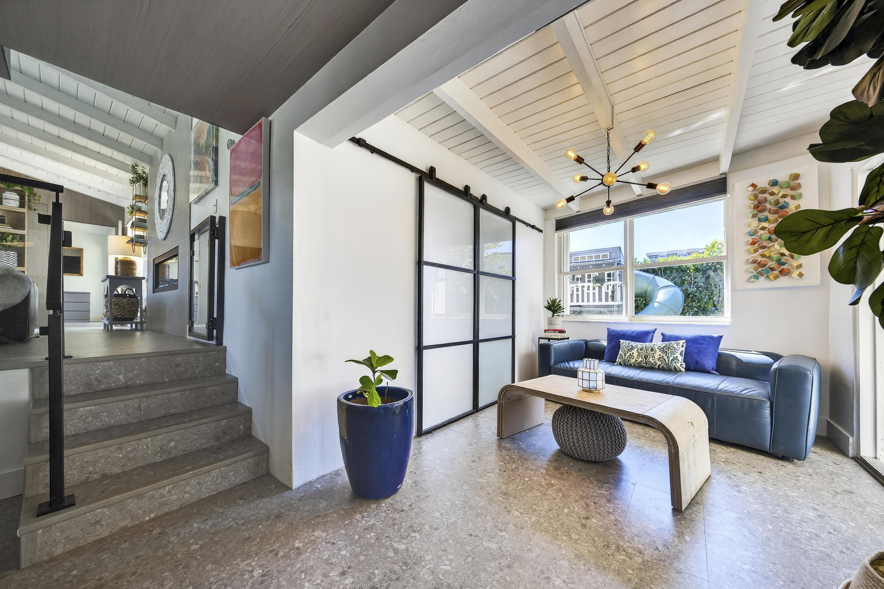 2630 Northeast 25th Street Lighthouse Point, FL 33064 - Photo 8 of 37 a living room with furniture and a potted plant
