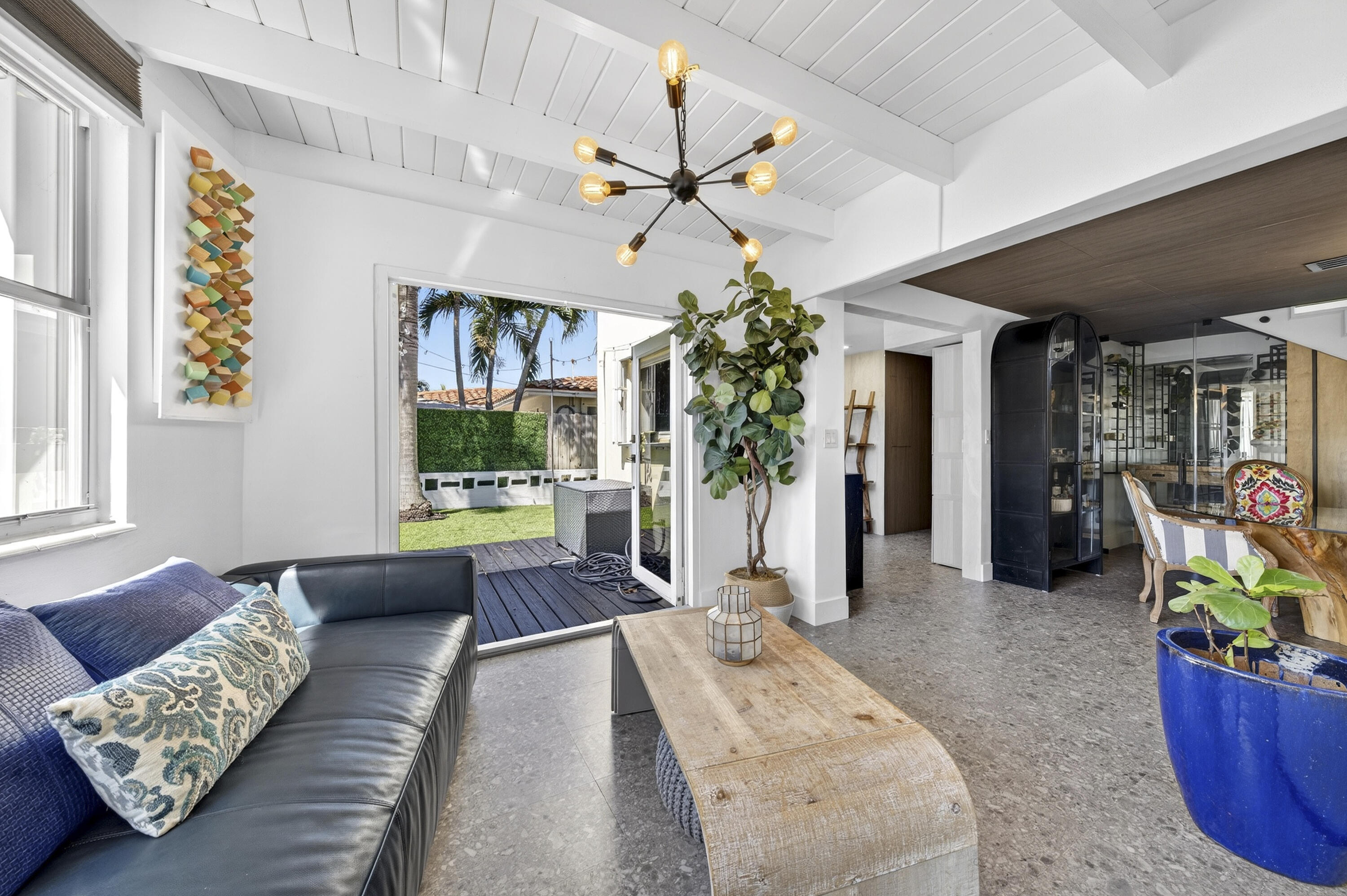 2630 Northeast 25th Street Lighthouse Point, FL 33064 - Photo 9 of 37 a living room with furniture and a potted plant