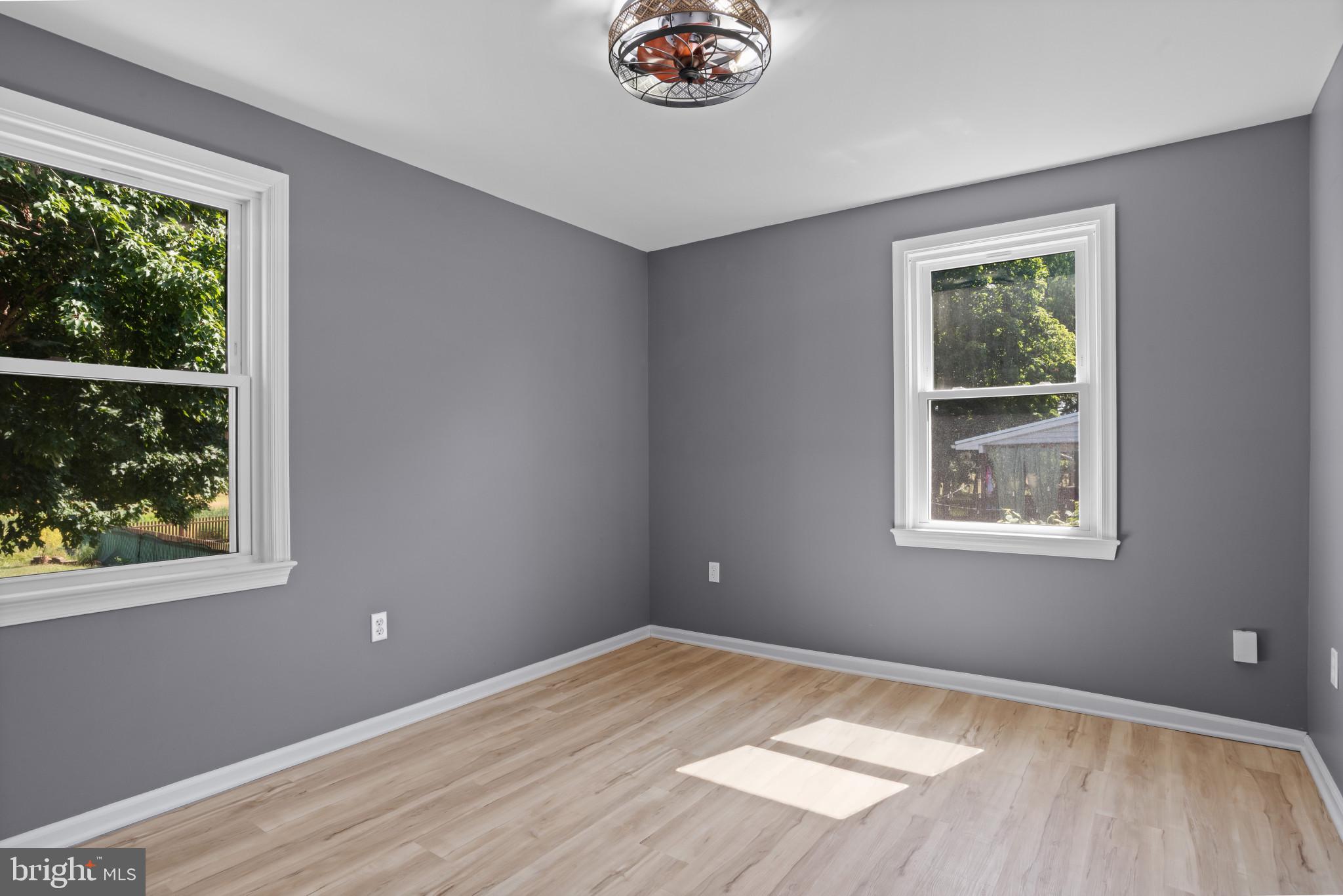 14 Sharon Road Enola, PA 17025 - Photo 19 of 40 Room featuring two windows with white trim, light