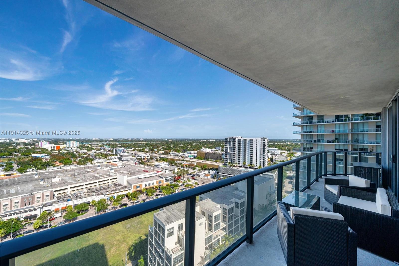 121 Northeast 34th Street, Unit 2109 Miami, FL 33137 - Photo 17 of 19 a view of a balcony with an ocean view