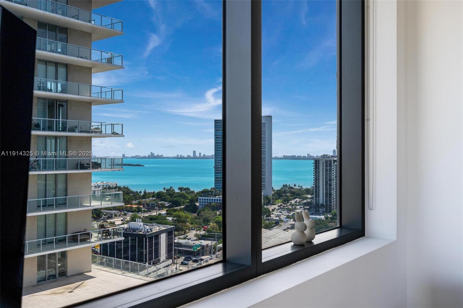 121 Northeast 34th Street, Unit 2109 Miami, FL 33137 - Photo 7 of 19 a view of a city view from a balcony