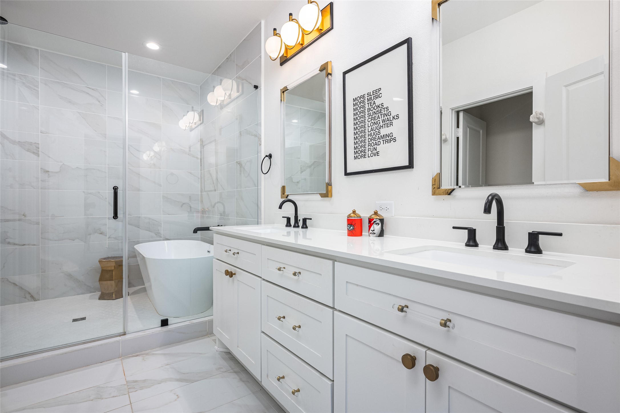 1747 Ojeman Spring Lane Houston, TX 77055 - Photo 12 of 22 a bathroom with a double vanity sink toilet and shower