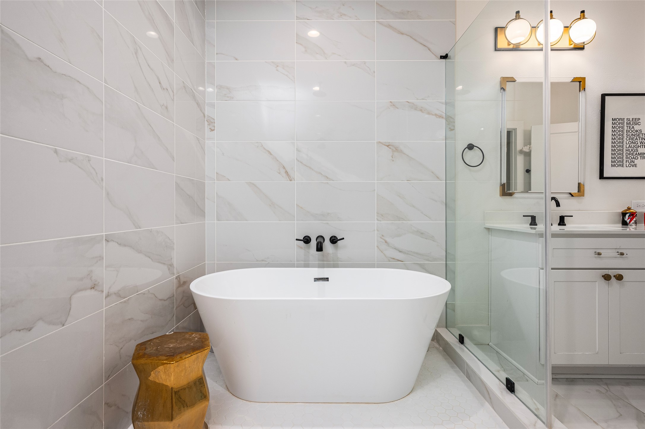 1747 Ojeman Spring Lane Houston, TX 77055 - Photo 13 of 22 a white bath tub sitting in a bathroom and sink