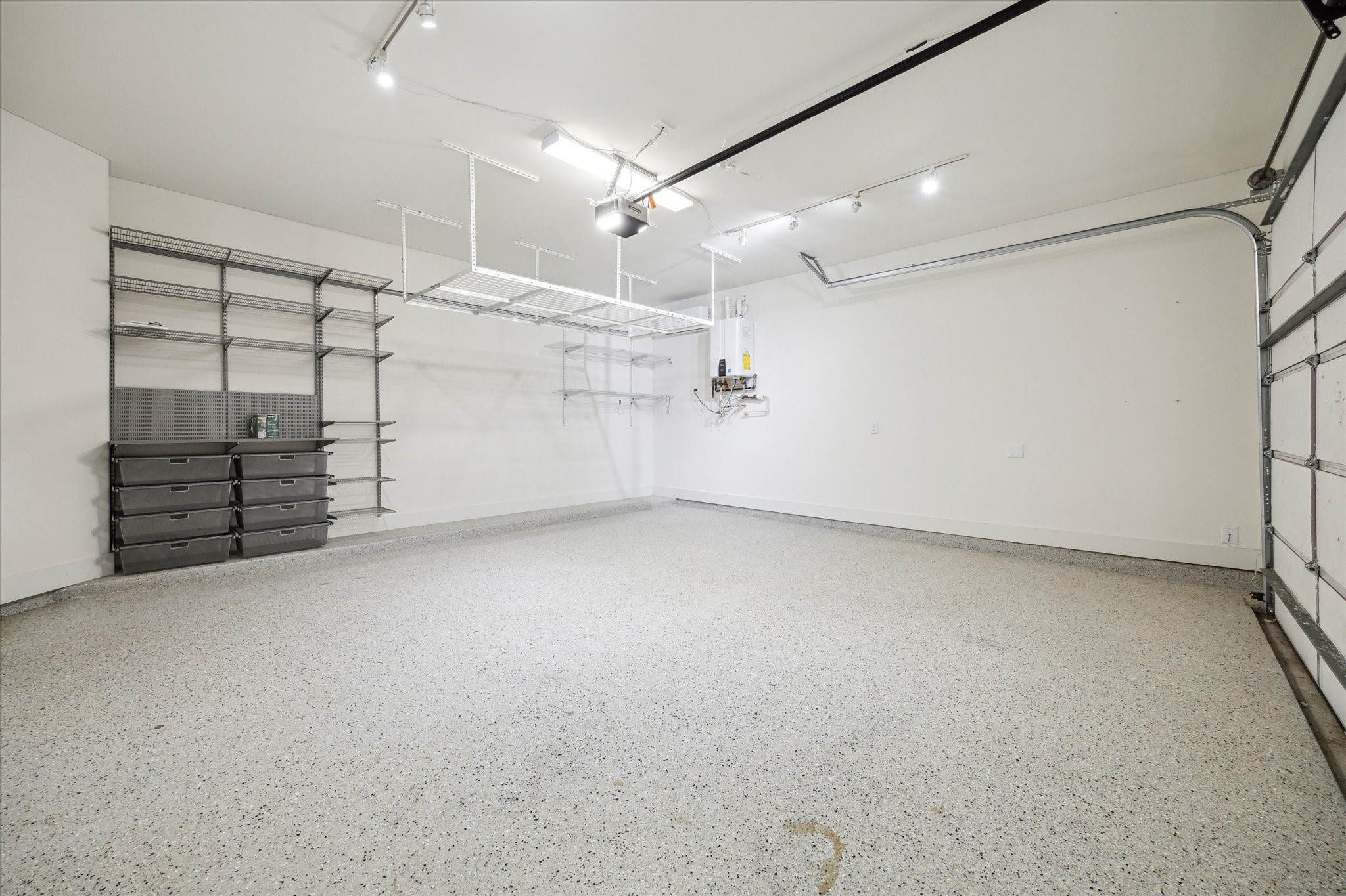 1747 Ojeman Spring Lane Houston, TX 77055 - Photo 20 of 22 an empty room with storage and utility