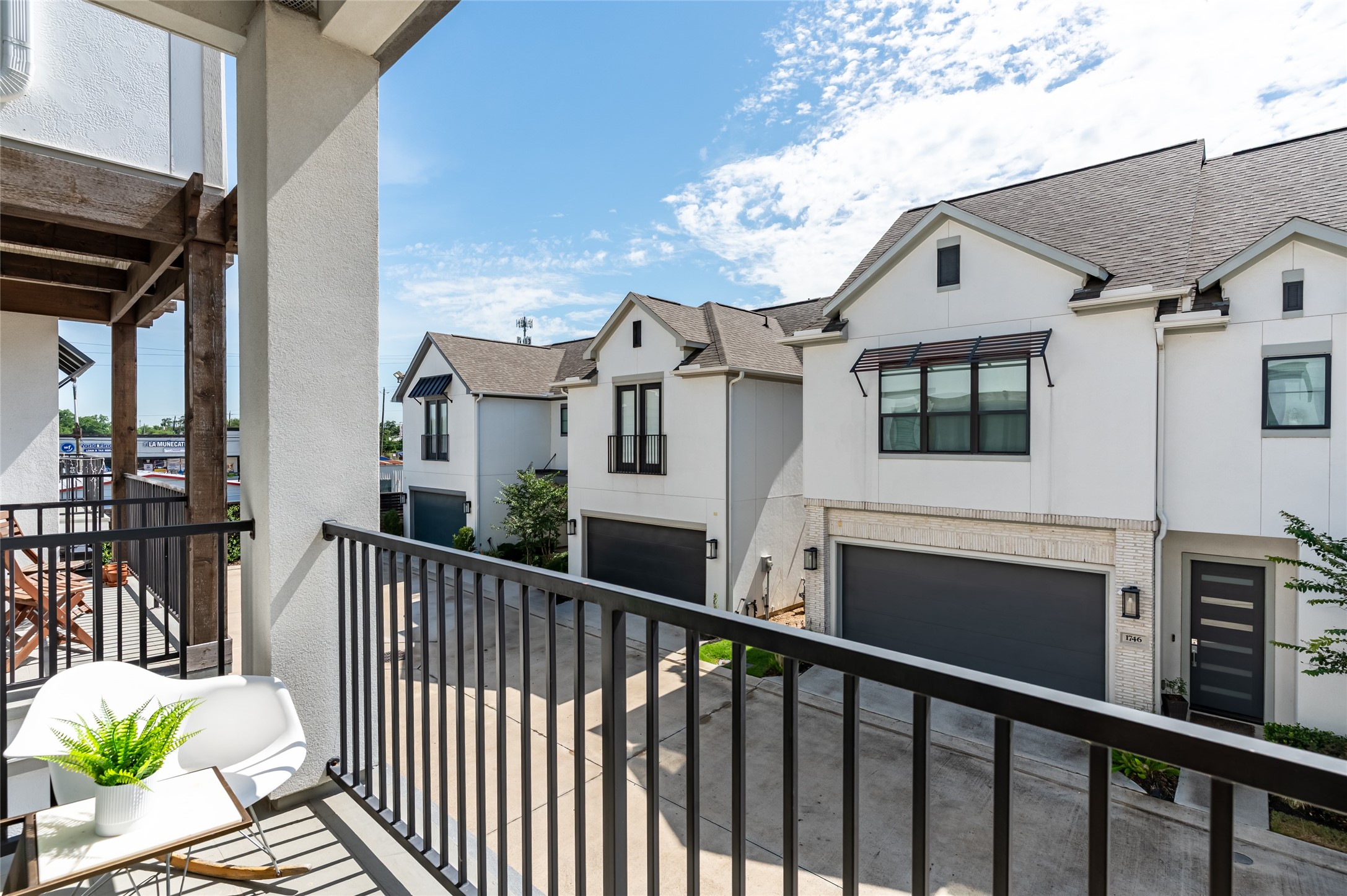 1747 Ojeman Spring Lane Houston, TX 77055 - Photo 4 of 22 a view of a street from a balcony