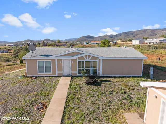 a view of a house with a terrace